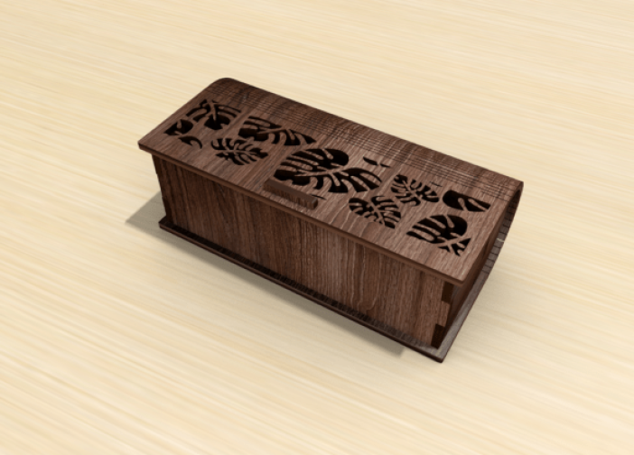 Caja de libros con diseñ de hojas