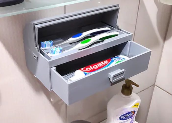 Caja retraible para sepillo y crema dental