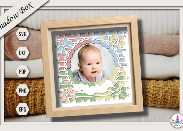 Marco de fotos para bebé con caja de sombra y lazos